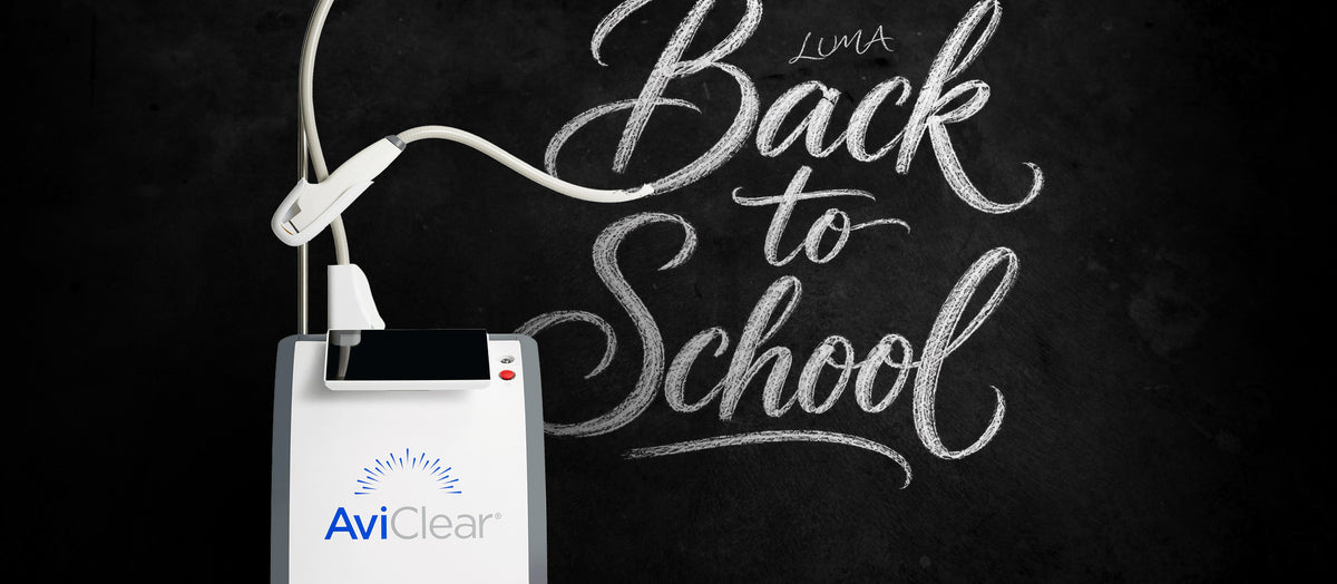 AviClear laser device beside chalk lettering reading Luma Back to School